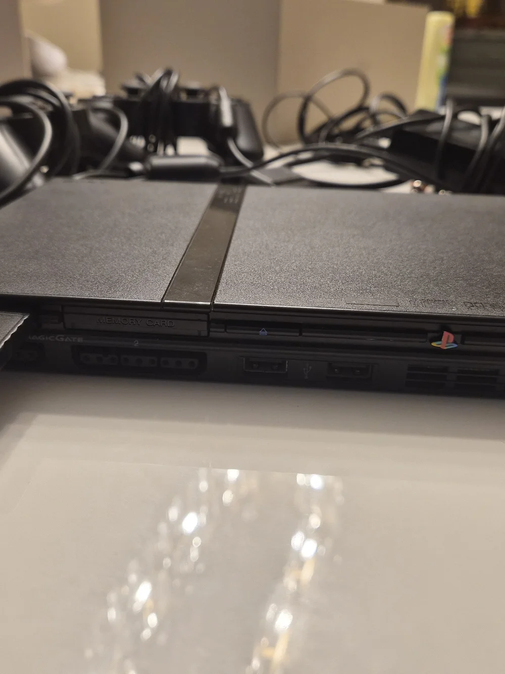 Sony Black PlayStation 2 Slim System with DualShock Controllers and Cables